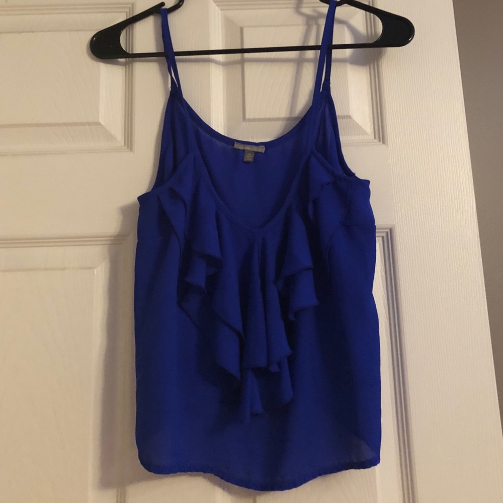 Sheer spaghetti strap tank .